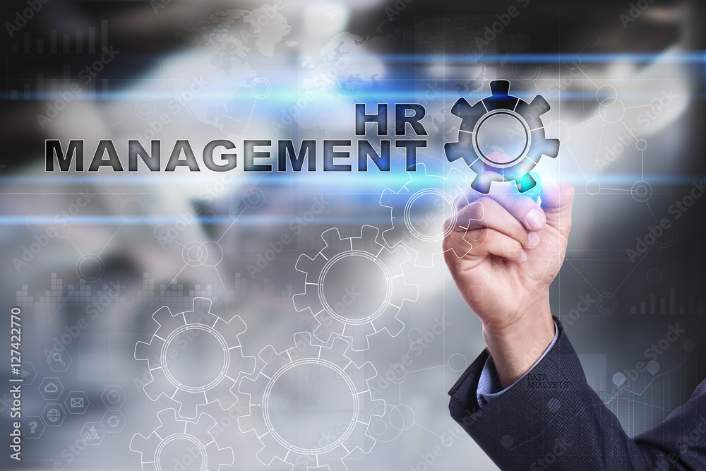 Businessman is drawing on virtual screen. hr management concept