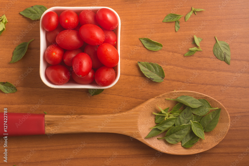 Fresh Basil Leaves and Cherry Tomatoes Fresh Basil Leaves and Cherry Tomatoes