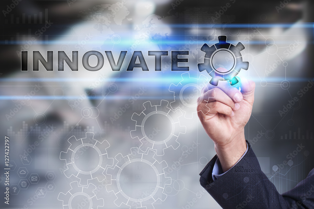 Businessman is drawing on virtual screen. innovate concept Businessman is drawing on virtual screen. innovate concept