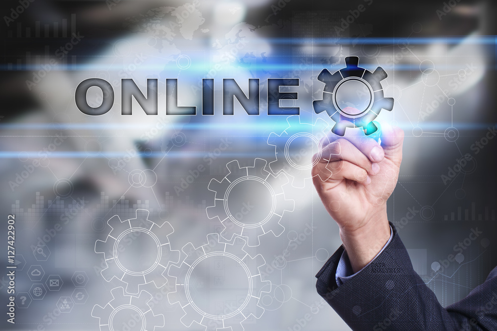 Businessman is drawing on virtual screen. online concept Businessman is drawing on virtual screen. online concept