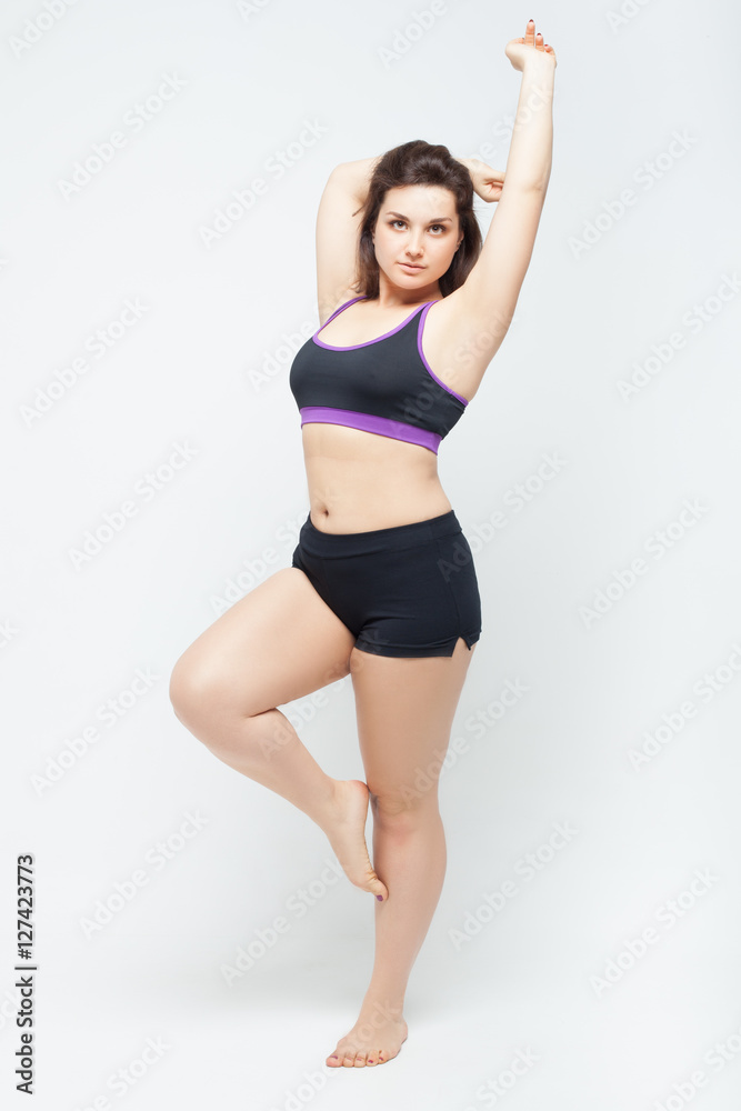 Beautiful plump young woman in the sports underwear Beautiful plump young woman in the sports underwear