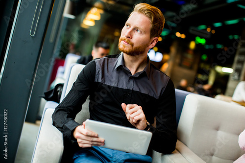 Young man with tablet