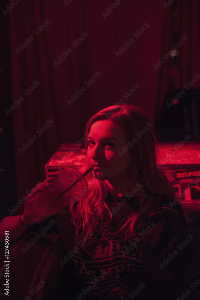 Portrait of a beautiful young woman at a nightclub Portrait of a beautiful young woman at a nightclub