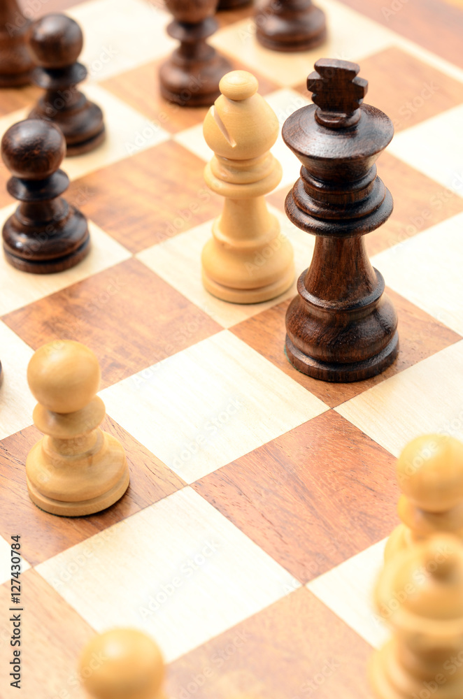 Chess pieces on chessboard