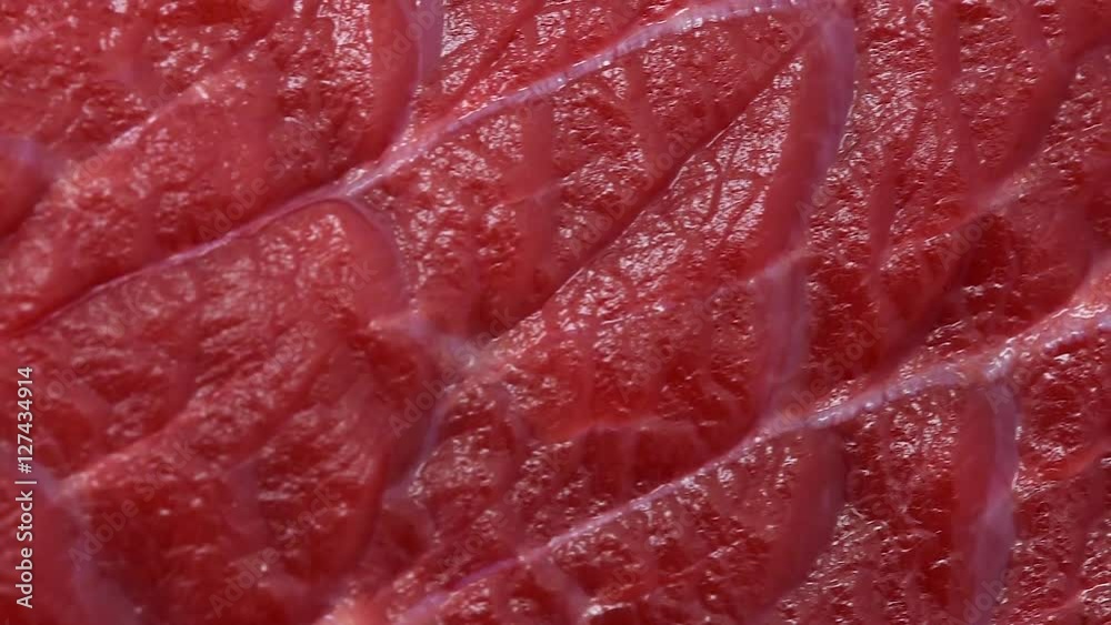 Rotating beef meat at white isolated background Rotating beef meat at white isolated background