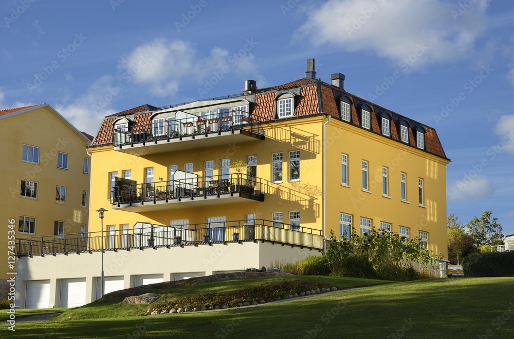 Nynashamn - a view of a colorful buildings on a public park. Nynashamn is located far south in Sodertorn, 58 kilometers south of Stockholm. Nynashamn - a view of a colorful buildings on a public park. Nynashamn is located far south in Sodertorn, 58 kilometers south of Stockholm.