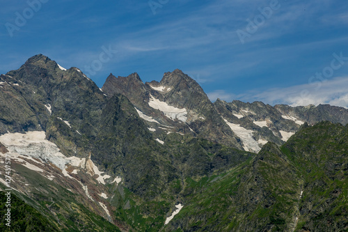 Snow in summer on cliffs in mountain Abkhazia 