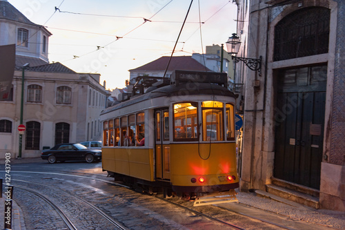 Tram on street at evening in Lisbon, Portugal
