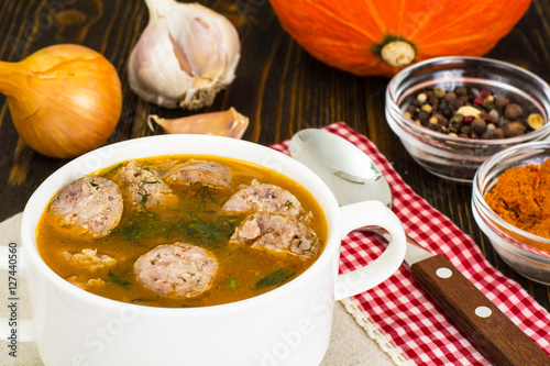 Vegetable soup with curry and sausage