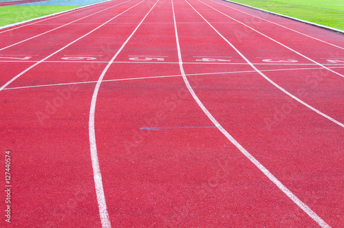 running track and green grass,Direct athletics Running track at Sport Stadium