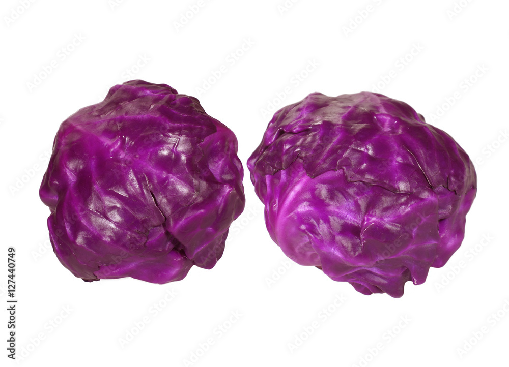 Close-up of two fresh whole red cabbages isolated on white background 