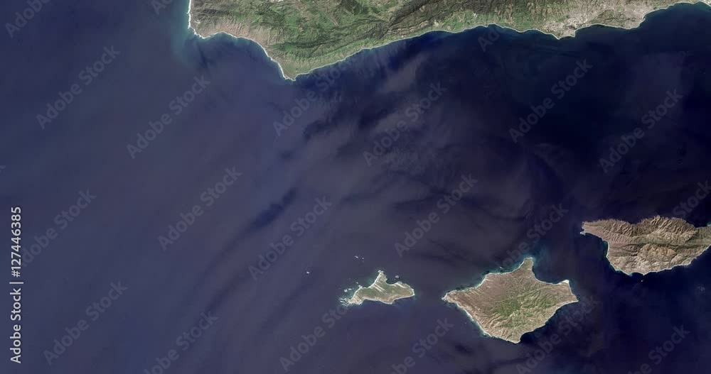 High-altitude overflight aerial of the California coast off Santa Barbara. Clip loops and is reversible. Elements of this image furnished by NASA High-altitude overflight aerial of the California coast off Santa Barbara. Clip loops and is reversible. Elements of this image furnished by NASA