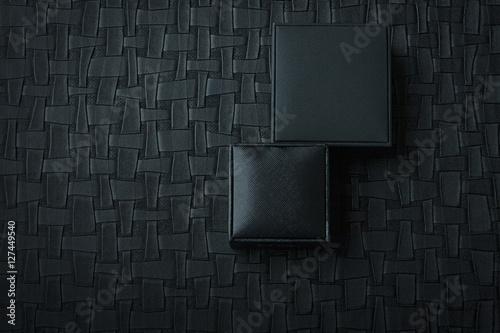 Male gift boxes on black leather background