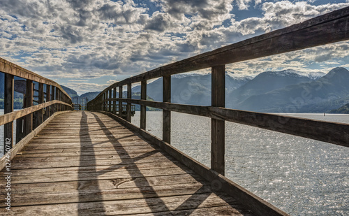 Wooden Pier in Mountainous Setting