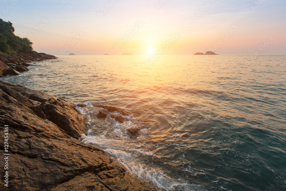 Fototapeta premium Rocky seashore at sunset.