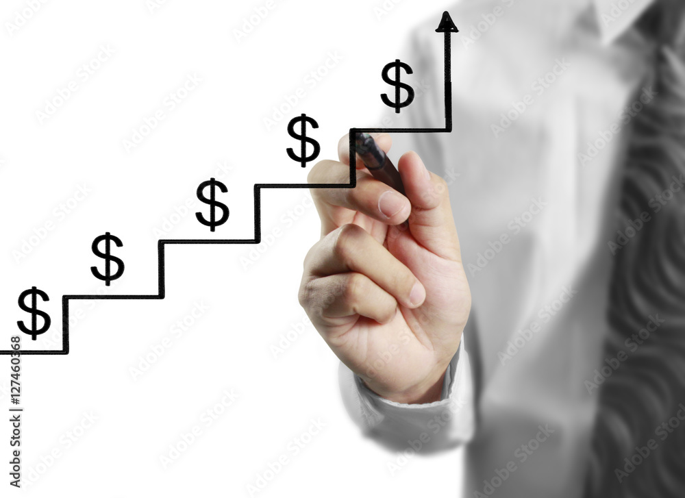Businessman drawing graphics growing graph Businessman drawing graphics growing graph