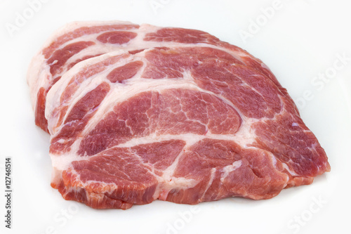 Raw meat, pork, slices pork on a white background