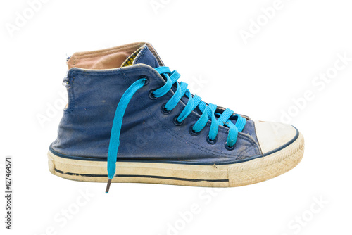 Old Blue sneaker shoes isolated on white background.