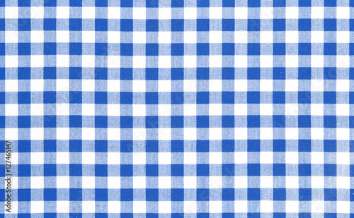 Blue picnic cloth background.