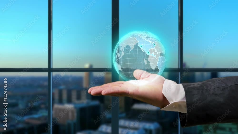 hand holding a growing earth globe on his hand business background