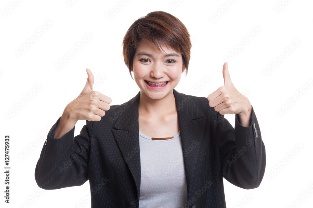Young Asian business woman show two thumbs up. Young Asian business woman show two thumbs up.