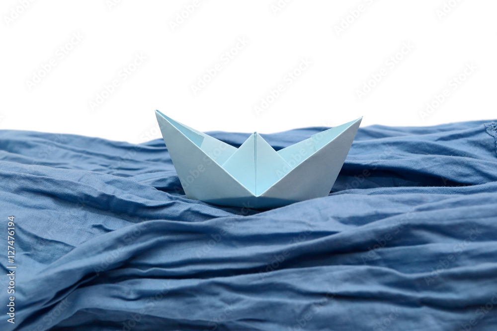 Obraz premium Blue paper boat, origami boats on white