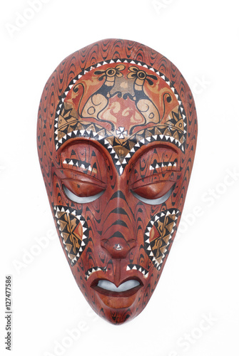 The African wooden mask on a white background