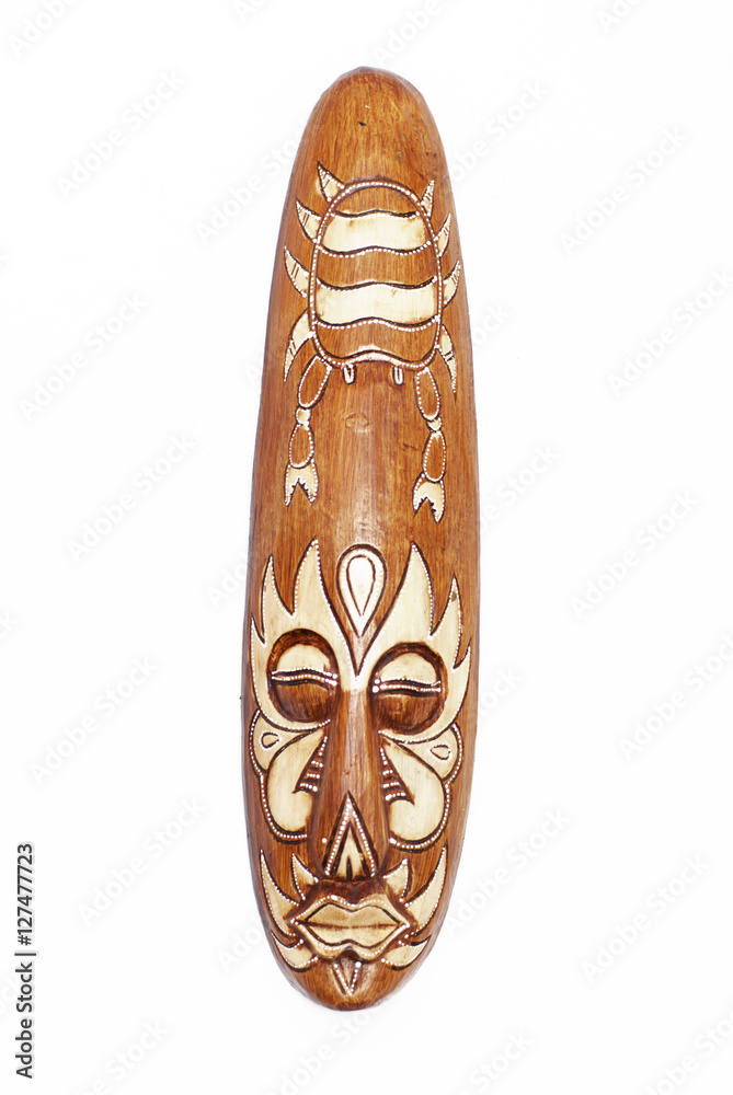The African wooden mask on a white background