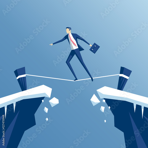 businessman tightrope walker is walking a tightrope across the gap in the rocks, an employee is walking a tightrope between two cliffs, business concept risk