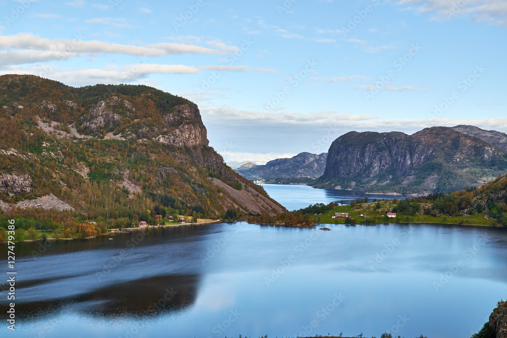 View over lake Ragsvatnet in the southern Norway, between tall vertical mountain sides