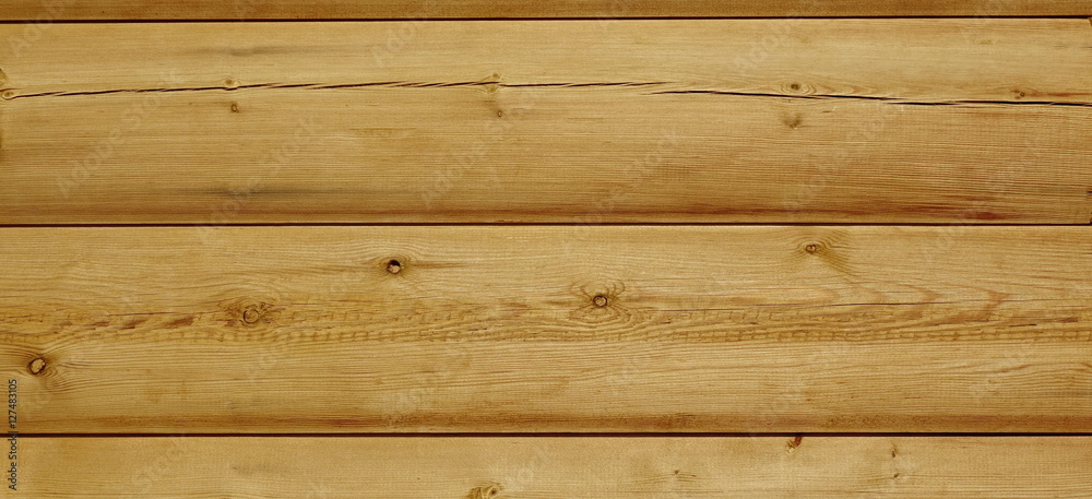 Naklejka premium Modern Rustic Natural Log Cabin Wall Facade Wide Background Text