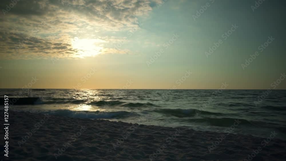 young man with healthy lifestyle jogging on the beach slow motion young man with healthy lifestyle jogging on the beach slow motion