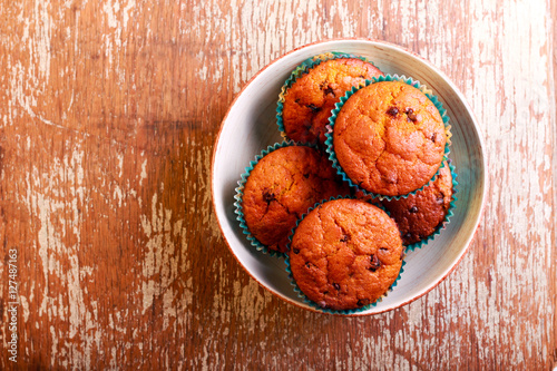 Pumpkin cakes with chocolate chips and raisin