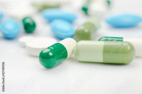 Blue and green pills photo