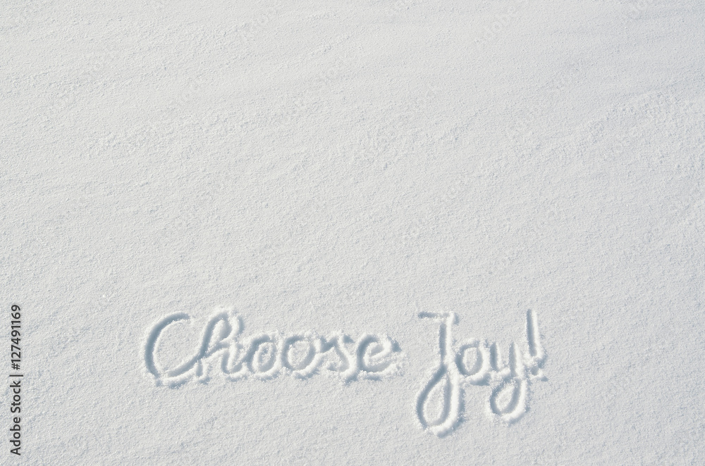Beautiful Choose Joy letters calligraphy handdrawn on flat snow surface. Nice Christmas holiday square postcard, greeting card template. Empty space for copy, text, lettering. Beautiful Choose Joy letters calligraphy handdrawn on flat snow surface. Nice Christmas holiday square postcard, greeting card template. Empty space for copy, text, lettering.