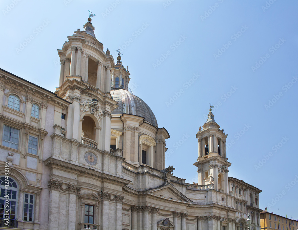 View of Sant Agnese in Agone on Piazza Navona. 17th-century church with frescoes, large-scale sculptures & a shrine containing St Agnes' skull.
