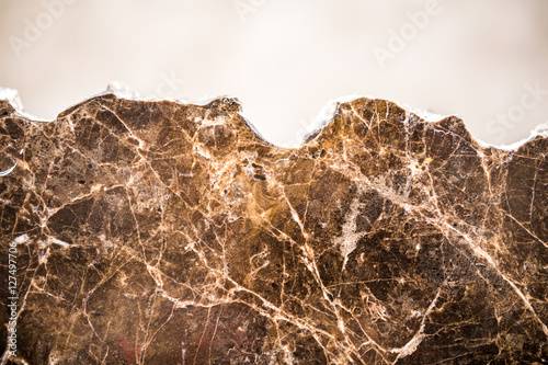 broken marble in the dark and warm colors