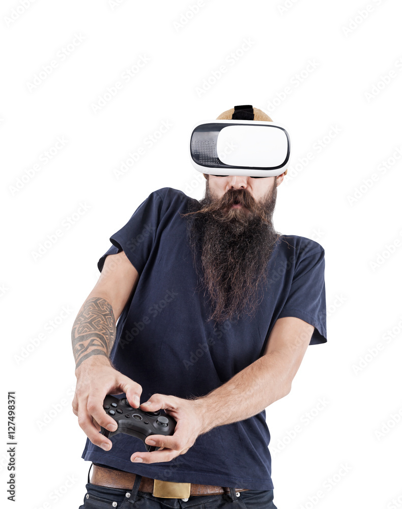 Isolated portrait of a bearded and tattooed man in vr glasses Isolated portrait of a bearded and tattooed man in vr glasses