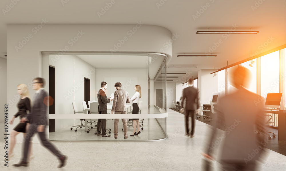Rear view of people in glass meeting room