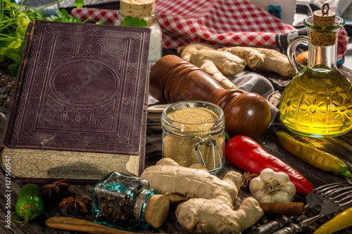 Old cook book with ingredients