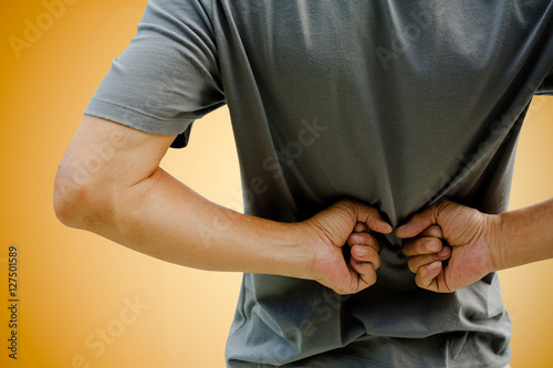 man having a back ache