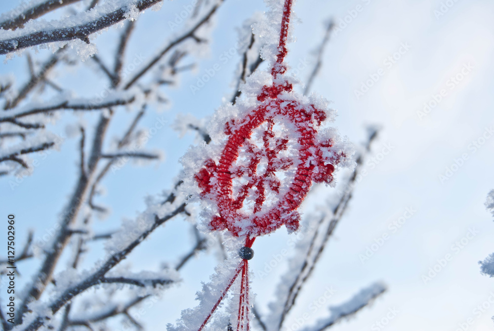 Frosty branches with Chinese wind chime Frosty branches with Chinese wind chime