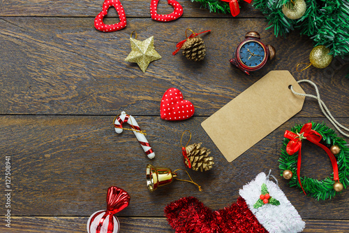 Top view greeting card with Christmas decoration on wooden table photo