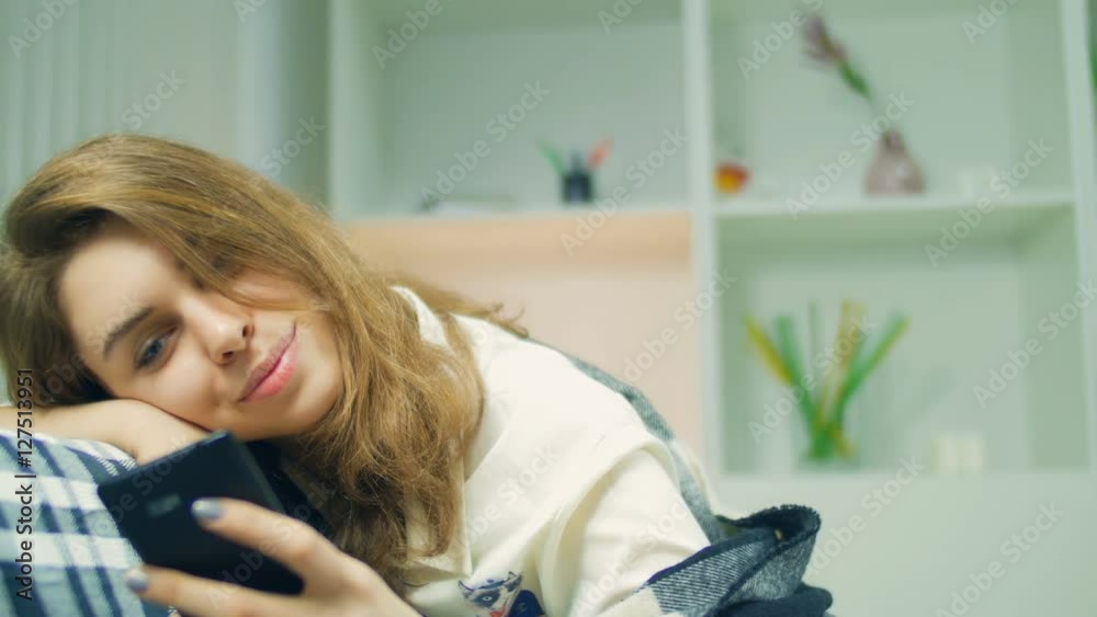 The young girl in love smiles