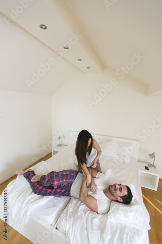 Couple having fun in bed