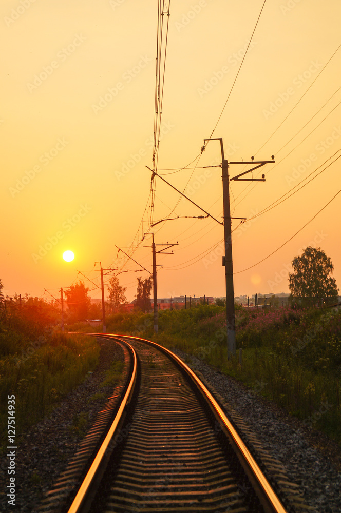 Railroad - Railway at sunset with sun Railroad - Railway at sunset with sun
