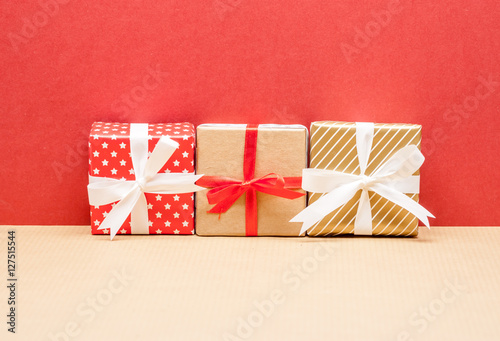 christmas presents on red paper background