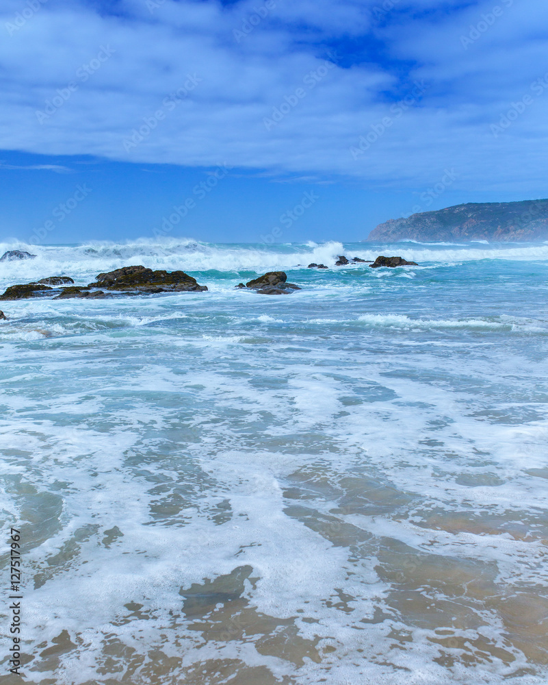 View of Guincho Beach, Cascais, Portugal. Empty beach. No people. Beauty in nature. Waves on the Atlantic ocean. Beautiful landscape. View of Guincho Beach, Cascais, Portugal. Empty beach. No people. Beauty in nature. Waves on the Atlantic ocean. Beautiful landscape.