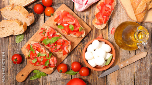 bruschettas with tomato,mozzarella and basil