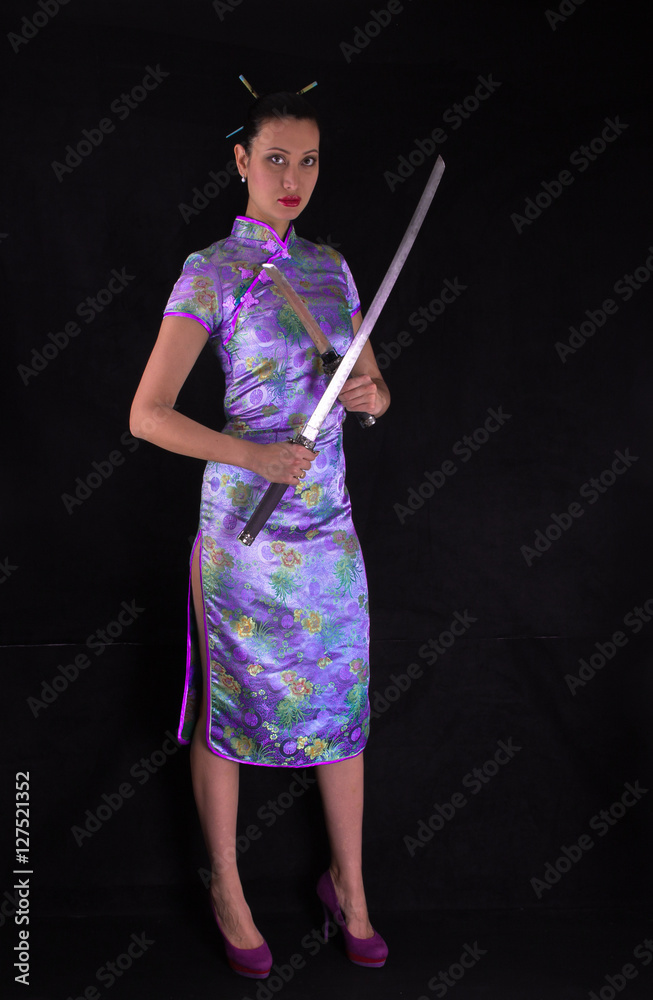 woman killer, oriental girl with a katana, studio portrait woman killer, oriental girl with a katana, studio portrait